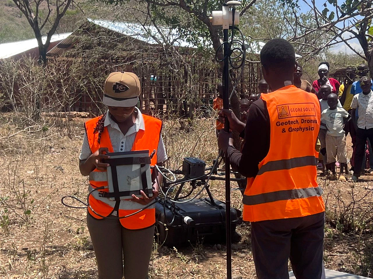 GeoResolve crew operating positioning and survey-control equipment in the Elgon Mountain ranges, Kween